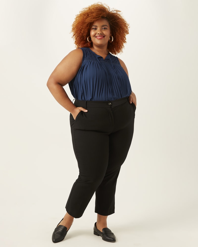 Front of 5'9" model wearing a plus size Caroline Ankle Pant in Black by Ryan Wylde. | dia_product_style_image_id:274257